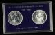 上海造幣廠鑄中國機製銀元鑄行一百周年紀念章二枚一套（直徑：40mm、帶盒、帶說明書）